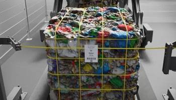 Automatische Ballenwiege- und Etikettiereinheit ergänzt die vollautomatischen HSM Kanalballenpressen